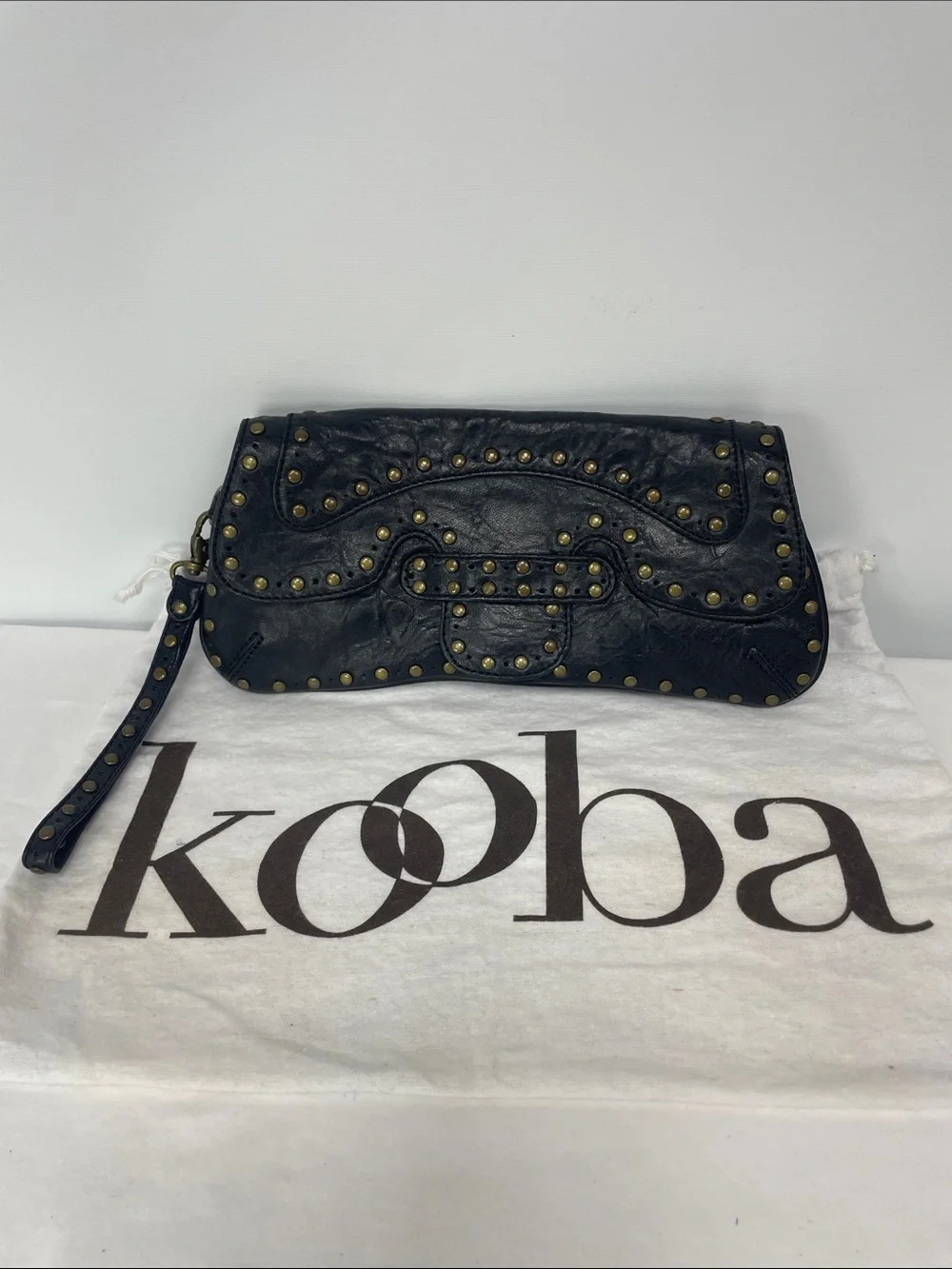 Kooba Black Leather Studded Wristlet Clutch with Brass Accents